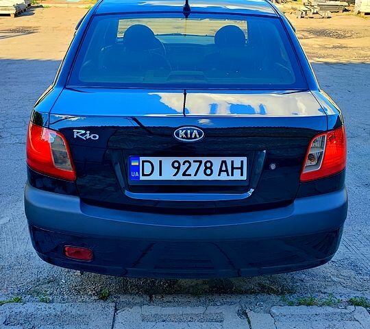Чорний Кіа Ріо, об'ємом двигуна 1.4 л та пробігом 260 тис. км за 3100 $, фото 4 на Automoto.ua
