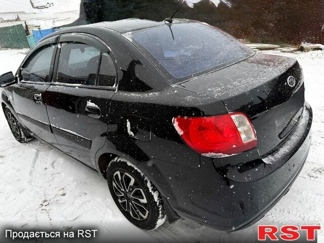 Чорний Кіа Ріо, об'ємом двигуна 1.4 л та пробігом 167 тис. км за 5550 $, фото 4 на Automoto.ua