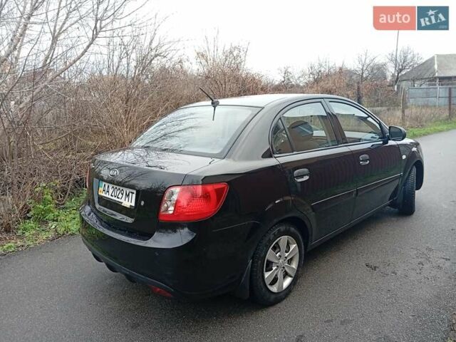 Черный Киа Рио, объемом двигателя 1.4 л и пробегом 186 тыс. км за 4800 $, фото 5 на Automoto.ua