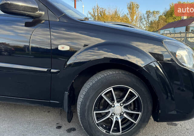 Чорний Кіа Ріо, об'ємом двигуна 1.5 л та пробігом 154 тис. км за 6900 $, фото 17 на Automoto.ua