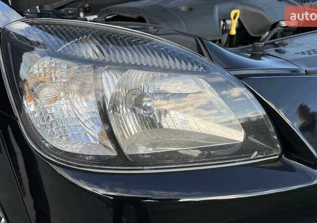 Чорний Кіа Ріо, об'ємом двигуна 1.5 л та пробігом 154 тис. км за 6900 $, фото 6 на Automoto.ua