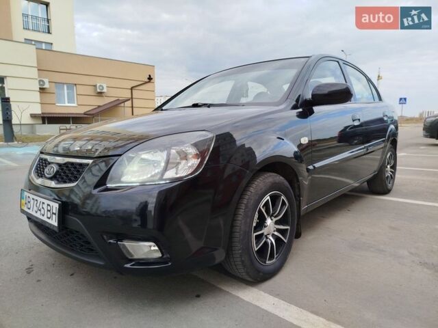 Черный Киа Рио, объемом двигателя 1.5 л и пробегом 155 тыс. км за 5650 $, фото 1 на Automoto.ua