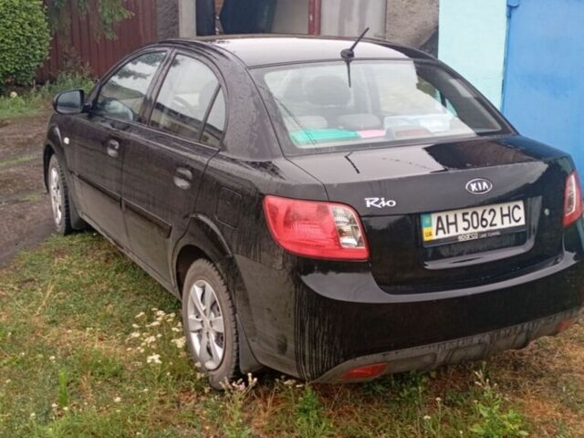 Чорний Кіа Ріо, об'ємом двигуна 1.4 л та пробігом 32 тис. км за 6800 $, фото 2 на Automoto.ua