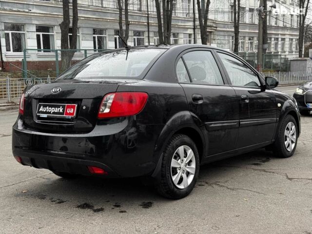Чорний Кіа Ріо, об'ємом двигуна 1.4 л та пробігом 151 тис. км за 6490 $, фото 11 на Automoto.ua