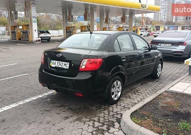 Черный Киа Рио, объемом двигателя 1.4 л и пробегом 150 тыс. км за 6000 $, фото 3 на Automoto.ua