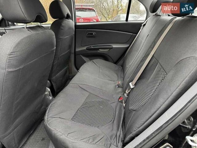 Черный Киа Рио, объемом двигателя 1.4 л и пробегом 151 тыс. км за 6490 $, фото 21 на Automoto.ua