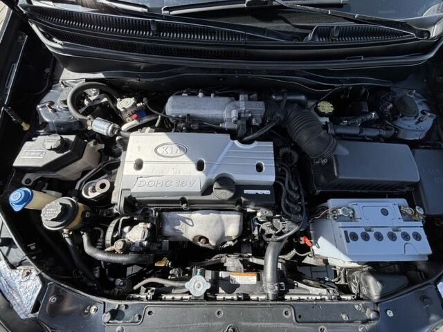 Черный Киа Рио, объемом двигателя 1.4 л и пробегом 290 тыс. км за 4500 $, фото 8 на Automoto.ua