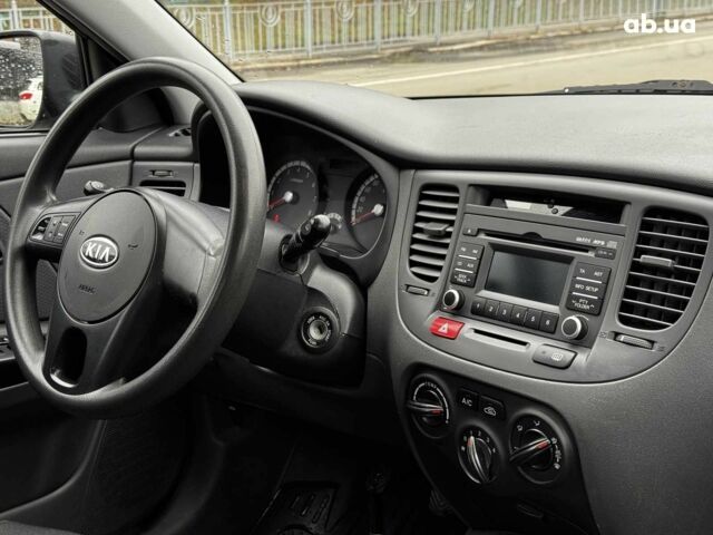 Чорний Кіа Ріо, об'ємом двигуна 1.4 л та пробігом 151 тис. км за 6490 $, фото 39 на Automoto.ua