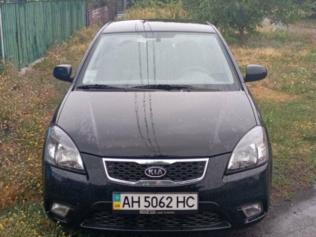 Чорний Кіа Ріо, об'ємом двигуна 1.4 л та пробігом 32 тис. км за 6500 $, фото 6 на Automoto.ua