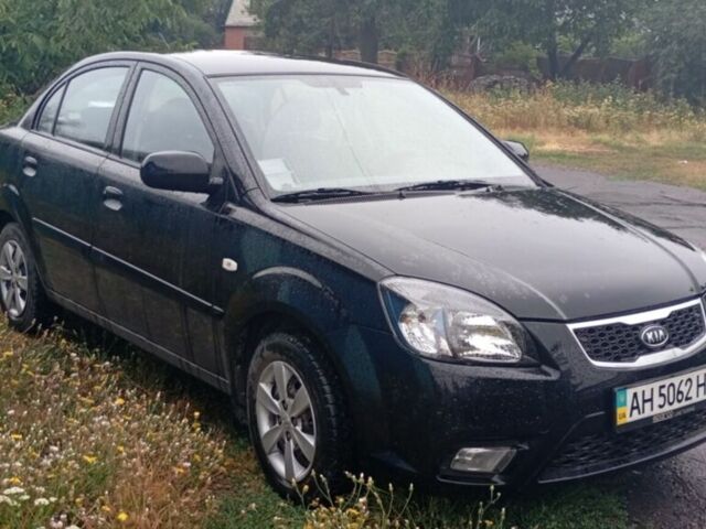 Чорний Кіа Ріо, об'ємом двигуна 1.4 л та пробігом 32 тис. км за 6800 $, фото 4 на Automoto.ua