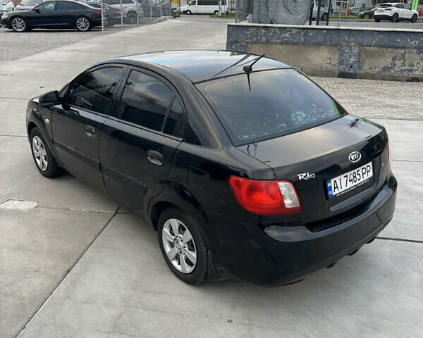 Кіа Ріо 2010 у Белой Церкве на Automoto.ua Чорний Кіа Ріо, об'ємом двигуна 1.4 л та пробігом 248 тис. км за 4250 $, фото 10 на Automoto.ua