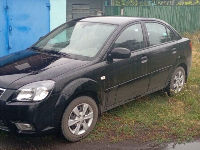 Чорний Кіа Ріо, об'ємом двигуна 1.4 л та пробігом 32 тис. км за 6500 $, фото 5 на Automoto.ua