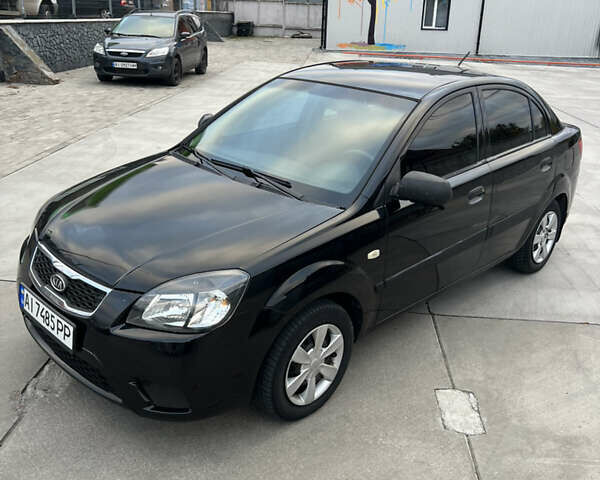 Кіа Ріо 2010 у Белой Церкве на Automoto.ua Чорний Кіа Ріо, об'ємом двигуна 1.4 л та пробігом 248 тис. км за 4250 $, фото 1 на Automoto.ua