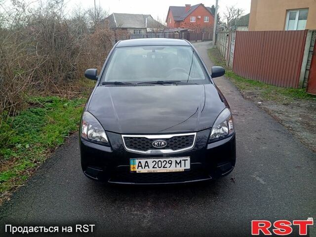 Черный Киа Рио, объемом двигателя 1.4 л и пробегом 186 тыс. км за 4800 $, фото 2 на Automoto.ua