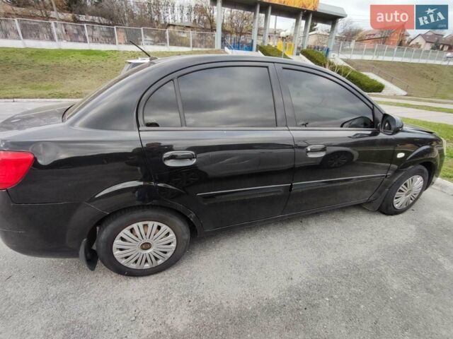 Черный Киа Рио, объемом двигателя 1.4 л и пробегом 253 тыс. км за 4000 $, фото 10 на Automoto.ua