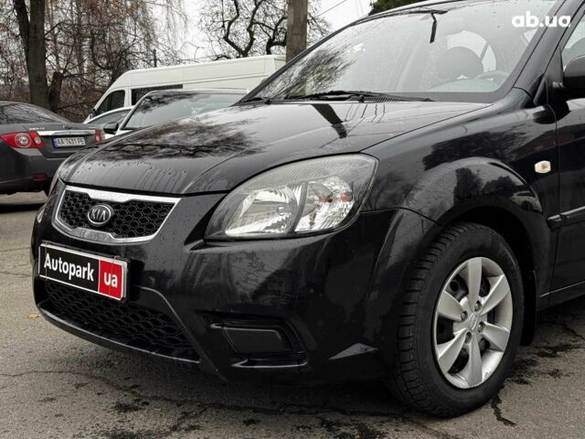Чорний Кіа Ріо, об'ємом двигуна 1.4 л та пробігом 151 тис. км за 6490 $, фото 2 на Automoto.ua