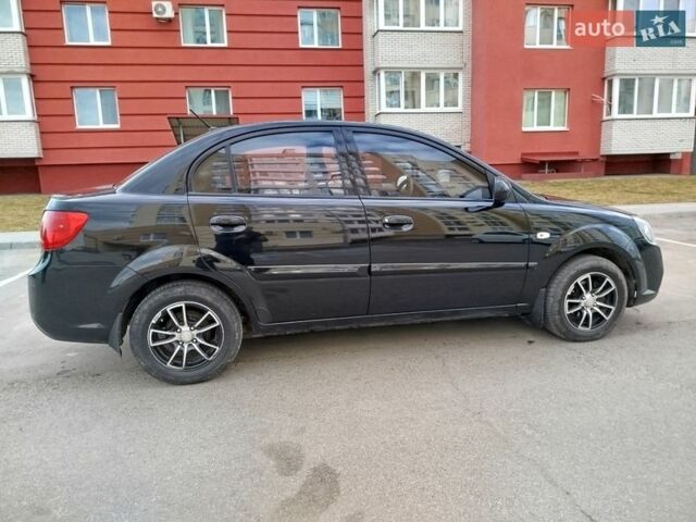 Черный Киа Рио, объемом двигателя 1.5 л и пробегом 155 тыс. км за 5650 $, фото 5 на Automoto.ua