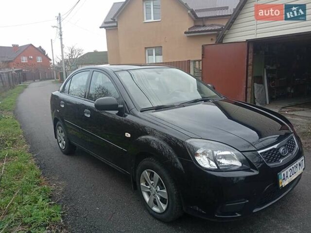 Черный Киа Рио, объемом двигателя 1.4 л и пробегом 186 тыс. км за 4800 $, фото 2 на Automoto.ua