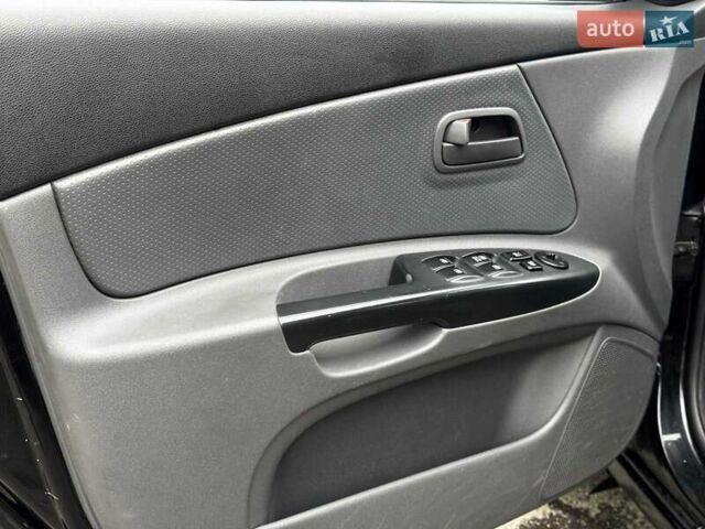 Черный Киа Рио, объемом двигателя 1.4 л и пробегом 151 тыс. км за 6490 $, фото 25 на Automoto.ua