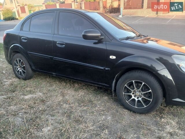 Чорний Кіа Ріо, об'ємом двигуна 1.4 л та пробігом 210 тис. км за 4700 $, фото 7 на Automoto.ua