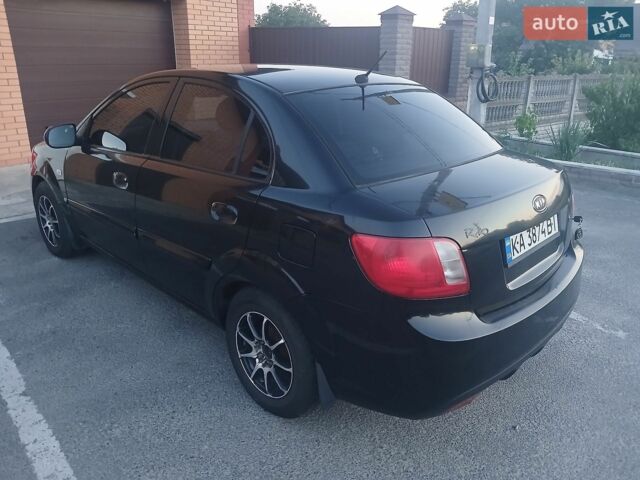 Чорний Кіа Ріо, об'ємом двигуна 1.4 л та пробігом 210 тис. км за 4700 $, фото 3 на Automoto.ua