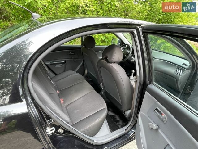 Черный Киа Рио, объемом двигателя 1.4 л и пробегом 91 тыс. км за 4500 $, фото 12 на Automoto.ua