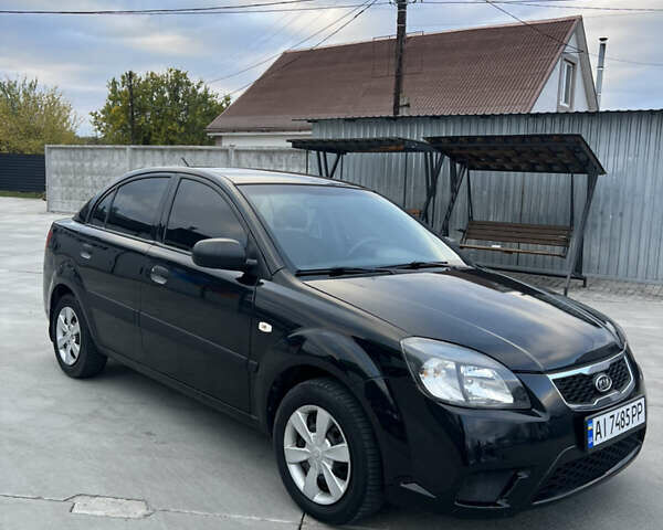 Кіа Ріо 2010 у Белой Церкве на Automoto.ua Чорний Кіа Ріо, об'ємом двигуна 1.4 л та пробігом 248 тис. км за 4250 $, фото 3 на Automoto.ua
