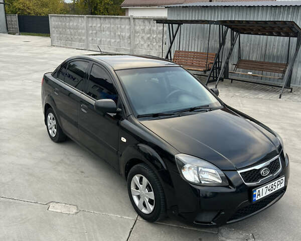 Кіа Ріо 2010 у Белой Церкве на Automoto.ua Чорний Кіа Ріо, об'ємом двигуна 1.4 л та пробігом 248 тис. км за 4250 $, фото 4 на Automoto.ua