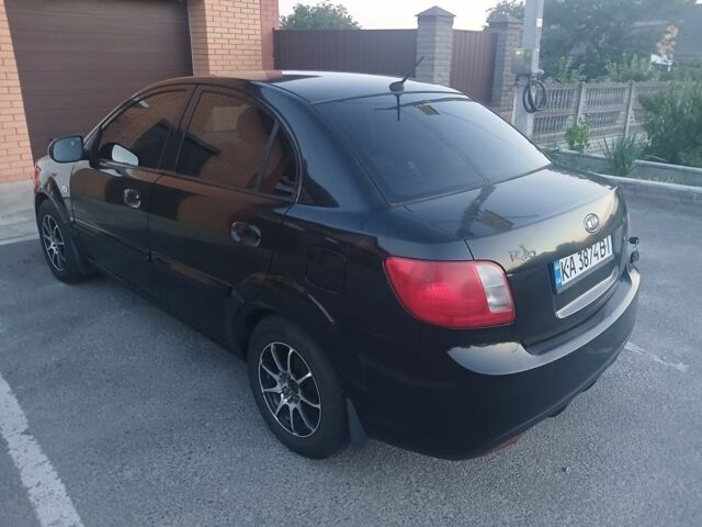 Чорний Кіа Ріо, об'ємом двигуна 1.4 л та пробігом 210 тис. км за 4308 $, фото 5 на Automoto.ua
