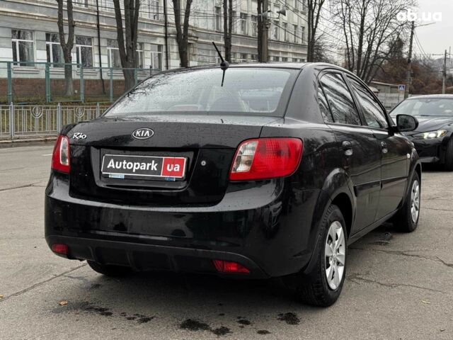 Чорний Кіа Ріо, об'ємом двигуна 1.4 л та пробігом 151 тис. км за 6490 $, фото 12 на Automoto.ua