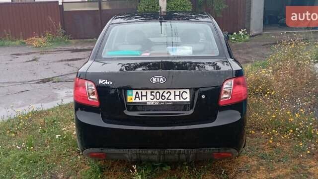 Черный Киа Рио, объемом двигателя 1.4 л и пробегом 32 тыс. км за 6800 $, фото 4 на Automoto.ua