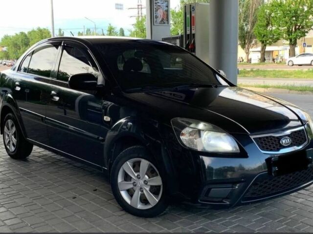 Чорний Кіа Ріо, об'ємом двигуна 1.4 л та пробігом 204 тис. км за 4600 $, фото 9 на Automoto.ua