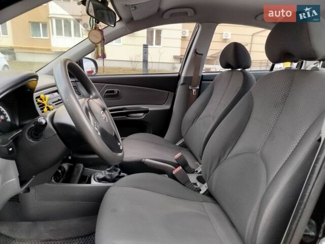 Черный Киа Рио, объемом двигателя 1.5 л и пробегом 155 тыс. км за 5650 $, фото 14 на Automoto.ua
