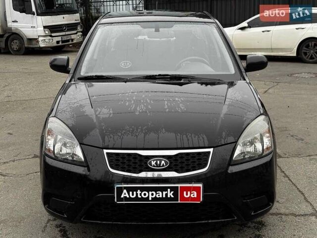 Черный Киа Рио, объемом двигателя 1.4 л и пробегом 151 тыс. км за 6490 $, фото 4 на Automoto.ua