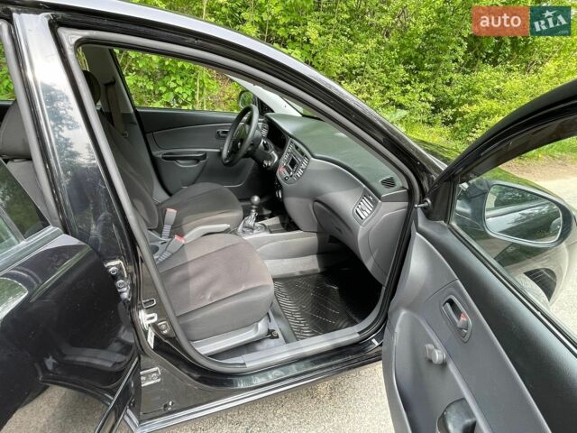 Черный Киа Рио, объемом двигателя 1.4 л и пробегом 91 тыс. км за 4500 $, фото 21 на Automoto.ua