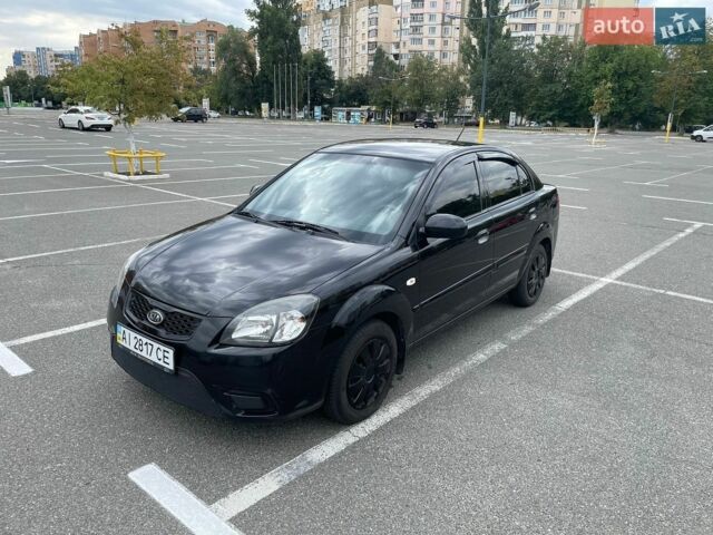 Черный Киа Рио, объемом двигателя 1.4 л и пробегом 179 тыс. км за 5000 $, фото 1 на Automoto.ua