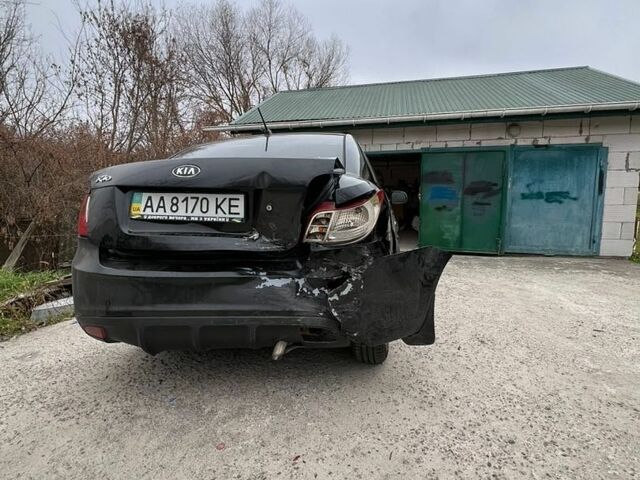 Черный Киа Рио, объемом двигателя 1.4 л и пробегом 377 тыс. км за 2500 $, фото 2 на Automoto.ua