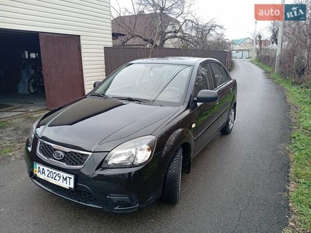 Черный Киа Рио, объемом двигателя 1.4 л и пробегом 186 тыс. км за 4800 $, фото 1 на Automoto.ua