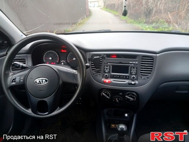 Чорний Кіа Ріо, об'ємом двигуна 1.4 л та пробігом 186 тис. км за 4800 $, фото 10 на Automoto.ua