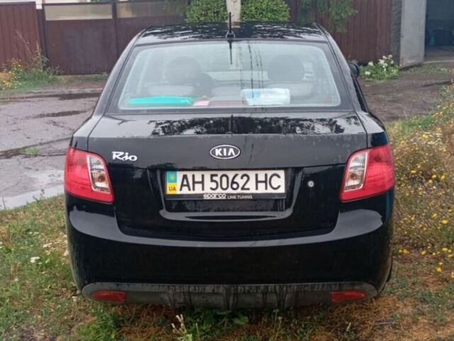 Чорний Кіа Ріо, об'ємом двигуна 1.4 л та пробігом 32 тис. км за 6800 $, фото 3 на Automoto.ua