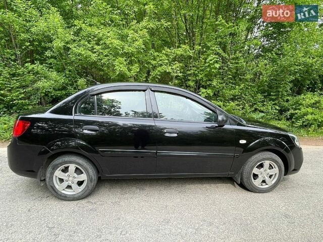 Черный Киа Рио, объемом двигателя 1.4 л и пробегом 91 тыс. км за 4800 $, фото 2 на Automoto.ua