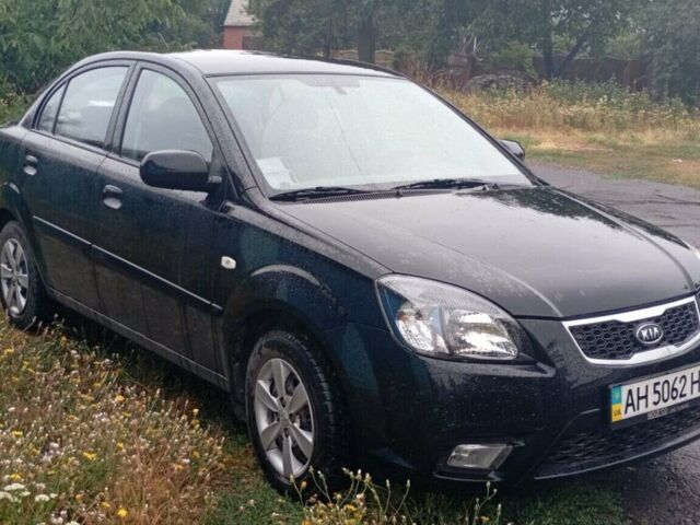 Чорний Кіа Ріо, об'ємом двигуна 1.4 л та пробігом 32 тис. км за 6500 $, фото 4 на Automoto.ua