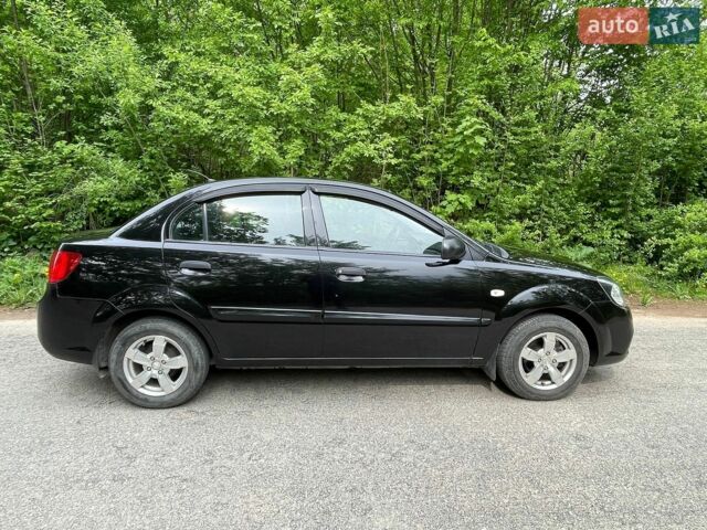 Черный Киа Рио, объемом двигателя 1.4 л и пробегом 91 тыс. км за 4500 $, фото 1 на Automoto.ua