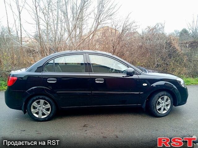 Чорний Кіа Ріо, об'ємом двигуна 1.4 л та пробігом 186 тис. км за 4800 $, фото 6 на Automoto.ua