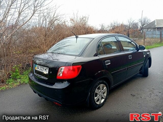 Чорний Кіа Ріо, об'ємом двигуна 1.4 л та пробігом 186 тис. км за 4800 $, фото 5 на Automoto.ua