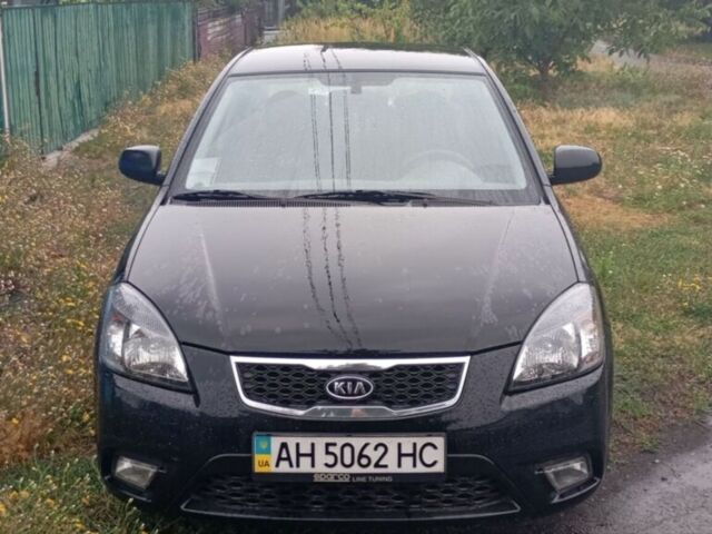 Чорний Кіа Ріо, об'ємом двигуна 1.4 л та пробігом 32 тис. км за 6800 $, фото 6 на Automoto.ua