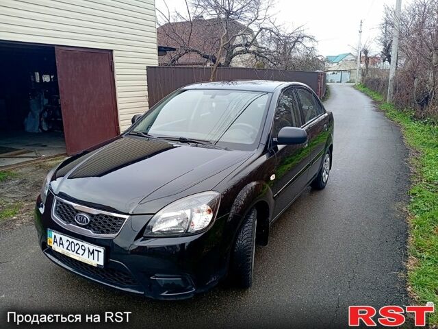 Чорний Кіа Ріо, об'ємом двигуна 1.4 л та пробігом 186 тис. км за 4800 $, фото 1 на Automoto.ua