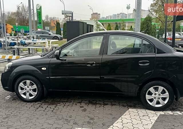 Черный Киа Рио, объемом двигателя 1.4 л и пробегом 150 тыс. км за 6000 $, фото 4 на Automoto.ua