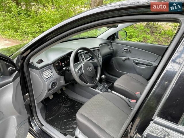 Черный Киа Рио, объемом двигателя 1.4 л и пробегом 91 тыс. км за 4500 $, фото 9 на Automoto.ua