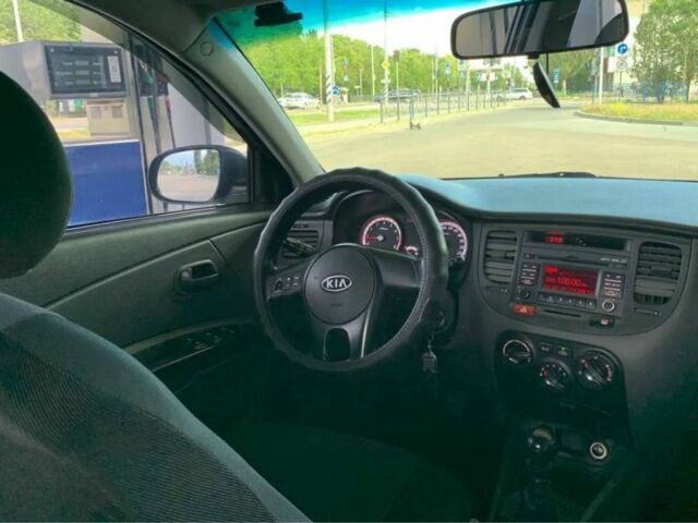 Чорний Кіа Ріо, об'ємом двигуна 1.4 л та пробігом 204 тис. км за 4600 $, фото 13 на Automoto.ua
